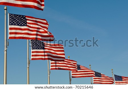 American Flags blowing in the wind at Washington Monument