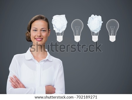 Digital composite of Woman standing next to light bulbs with crumpled paper balls in front of blackboard