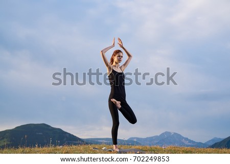 Woman yoga mountain sports