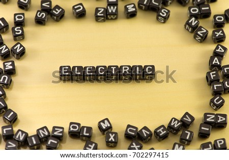 The word electric on wood background