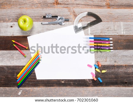 School supplies on wooden background. Back to school