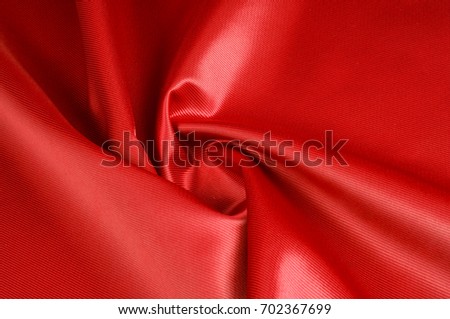 Texture, background, pattern. Red silk fabric.This satin fabric is perfect for making fabric flowers for use in hair accessories, jewery making, and fabric bouquets. 
