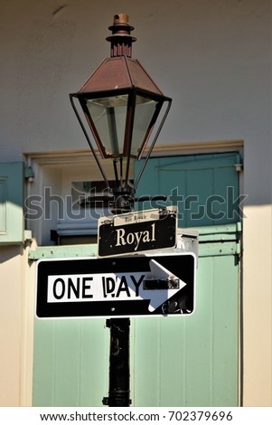 old lantern street light with street sign