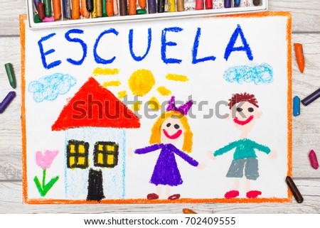 Photo of  colorful drawing: Spanish word SCHOOL, school building and happy children. First day at school. 