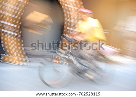 out of focus picture blurred for background abstract and can be illustration to article of people on bicycle