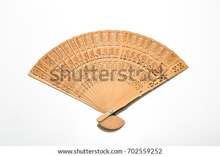  wooden chinese hand fan on white background.Selective focus.