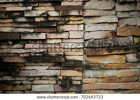 Old Colorful Stone Wall.