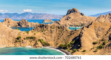 Panoramic view from the top of the island of Padar. Komodo National Park is a paradise for diving and outdoor enthusiasts. Now this is the most popular tourist destination in Indonesia 