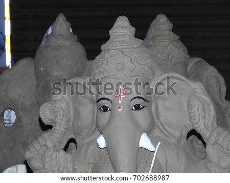 Lord Ganesh Statue, idol. Made of clay and soil, coated with ceramic colors, handmade artistic effects. He also known as Lord God Vinayaka and ganapati.