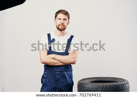 A man working at the enterprise, machines