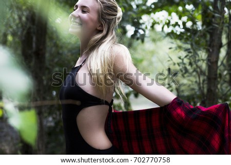 Girl in nature.
Young blonde girl posing in nature. 