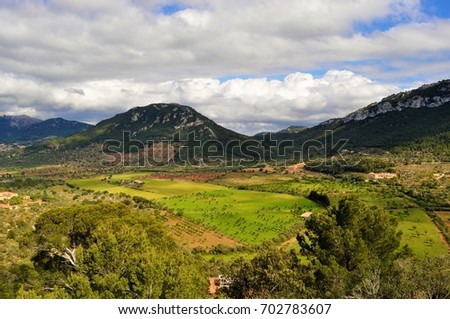 Field and mountains in Mallorca, Majorca Balearic Islands, Spain 