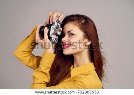 Photographer, woman with retro camera