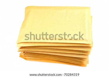 A stack of bubble lined shipping or packing envelopes.