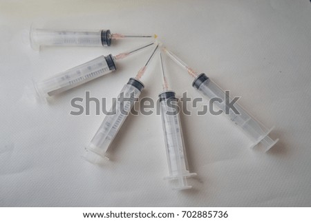                                needles and syringes