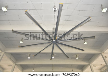 photo of a big ceiling fan in a building
