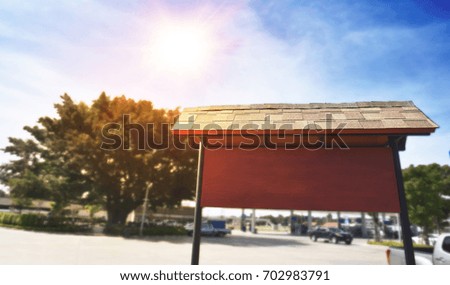 Blank wooden signboard in the blue sky just adds your message
