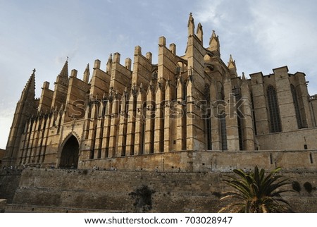 Big gothic church on the sea shore. Beautiful travel picture of Spain.