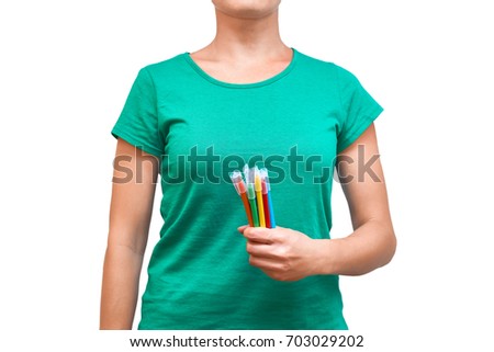 girl holding colored felt pens in her hand. Isolated on white background.