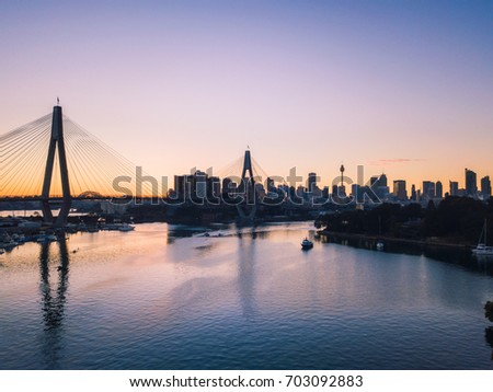 Sydney city and Anzac bridge view at sunrise time.
