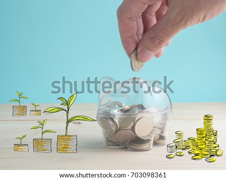 transparent see through piggy bank filled with coins on wood background.Saving investment colorful concept.Tree idea sketch cartoon style.Watering can and money tree drawn .
