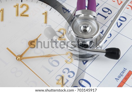 Regular medical examination concept, stethoscope on calendar and clock 