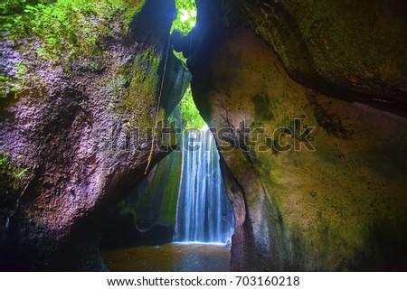 Tukad waterfall, Bali, Indonesia Royalty-Free Stock Photo #703160218