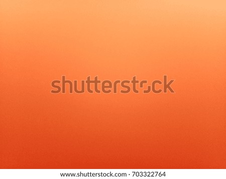 The orange background.
