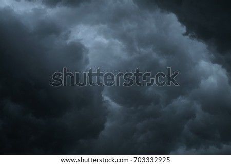 Dark sky during thunderstorm or dark clouds background