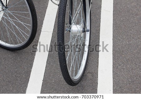 bicycle parked in the parking line