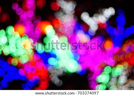 Multicolor light from LED lights close up and bokeh. A Business and Finance concept. Image has grain or blurry or noise and soft focus when view at full resolution. (Shallow DOF, slightly motion blur)