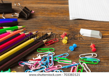 School supplies on old wooden table
