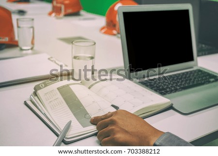 Close-up Of A Businesswoman's Hand On Laptop At Workplace