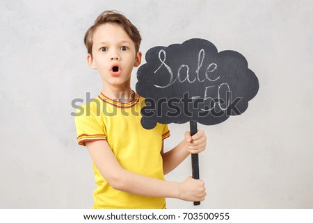 Little boy isolated on white studio portrait
