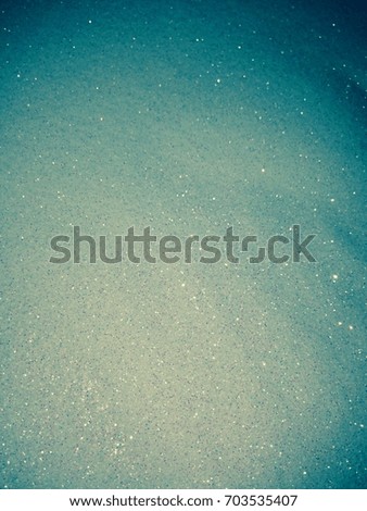 Blue filter on white glitter micro study (focus, unfocused, light, shadow, filtered)