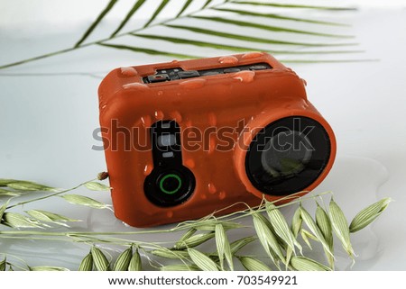 Action camera with water drops