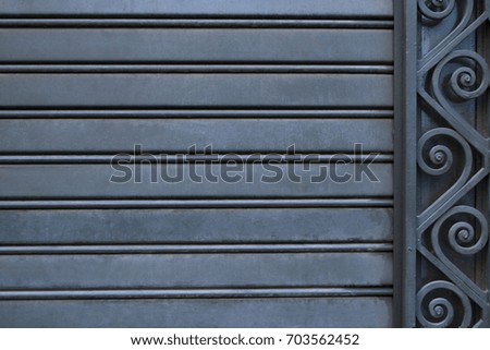 Iron shutters with ornament, structure / background / texture
