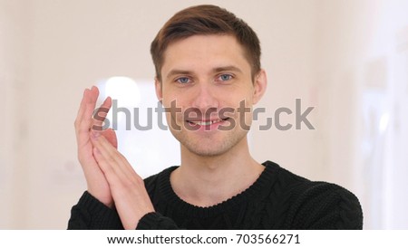 Portrait of Applauding, Clapping Man Sitting in Office