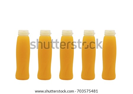 Plastic bottle of orange fruit water isolated on white background.
