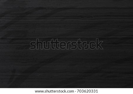 Close up of black marble texture background, macro shot. High resolution photo.