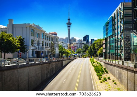view of a road going to the sky tower, auckland, new zealand