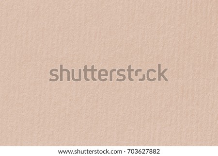 Texture of sheet of beige paper. High resolution photo.