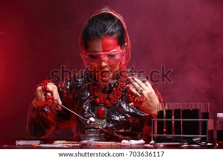 Chemistry Asian Doctor Woman with Red Tone Fashion Make up fancy lab test dress, studio lighting black dark background, safety gear hygiene hat and tube glass
