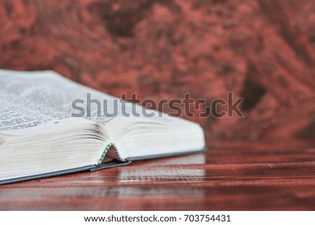 Bible on a wooden old table. Beautiful background.Religion concept.
