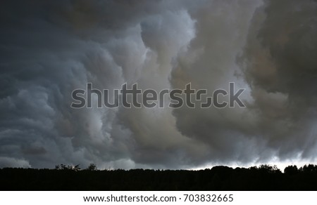 storm clouds Royalty-Free Stock Photo #703832665