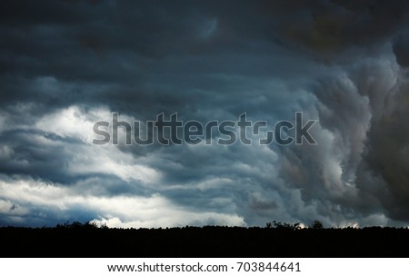 storm clouds Royalty-Free Stock Photo #703844641