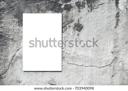Close-up empty blank canvas on background concrete wall