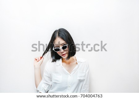 portrait of attractive asian hipster girl isolated on white background