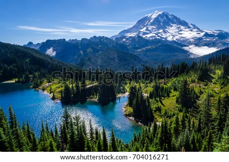 Mount Rainier and Eunice Lake as seen from Tolmie Peak Royalty-Free Stock Photo #704016271