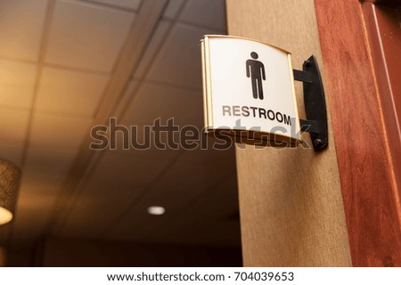 Public men restroom sign close up image